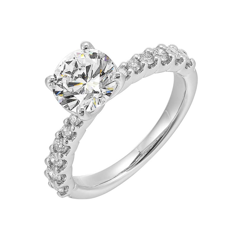 The gradual narrowing of the band towards the center creates a delicate and feminine look,  drawing the eye towards the center solitare and making it more appealing.