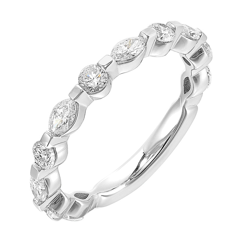 Round and marquise diamonds create an distinctive pattern across the top of this classic band is perfect to stack with ring of your choice.