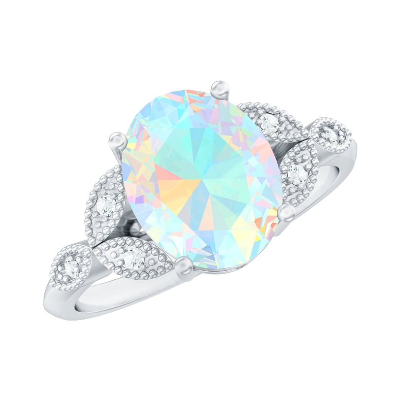 Vintage Inspired Oval Opal Engagement Ring with Diamond