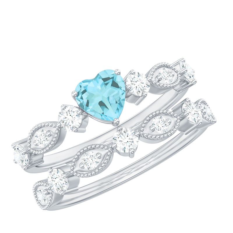 1.25 CT Sky Blue Topaz and Moissanite Ring Set in Prong Setting