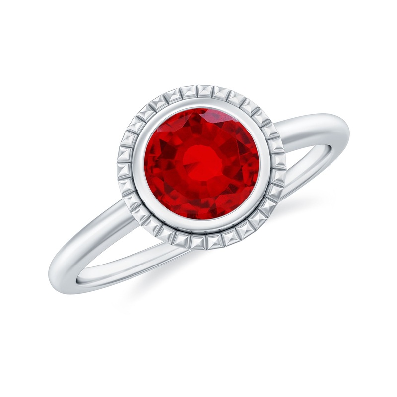 Round Lab-Created Ruby Solitaire Gold Ring in Bezel Setting