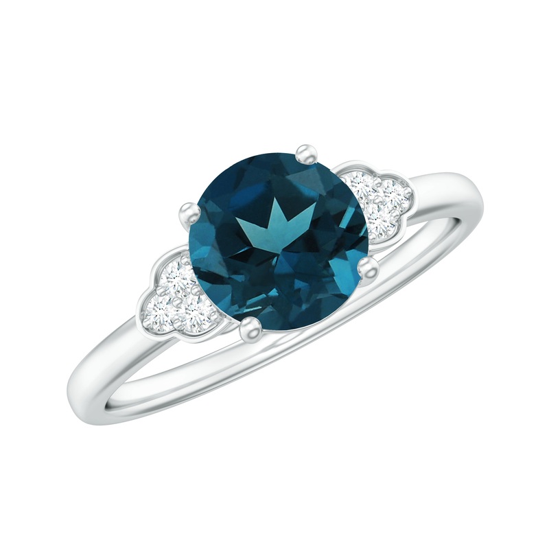 Round London Blue Topaz Solitaire Ring with Diamond Trio
